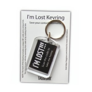 A black keyring with the text 'I'm Lost Keyring' printed on it, displayed on a white packaging card with the brand name 'TaggDor'.